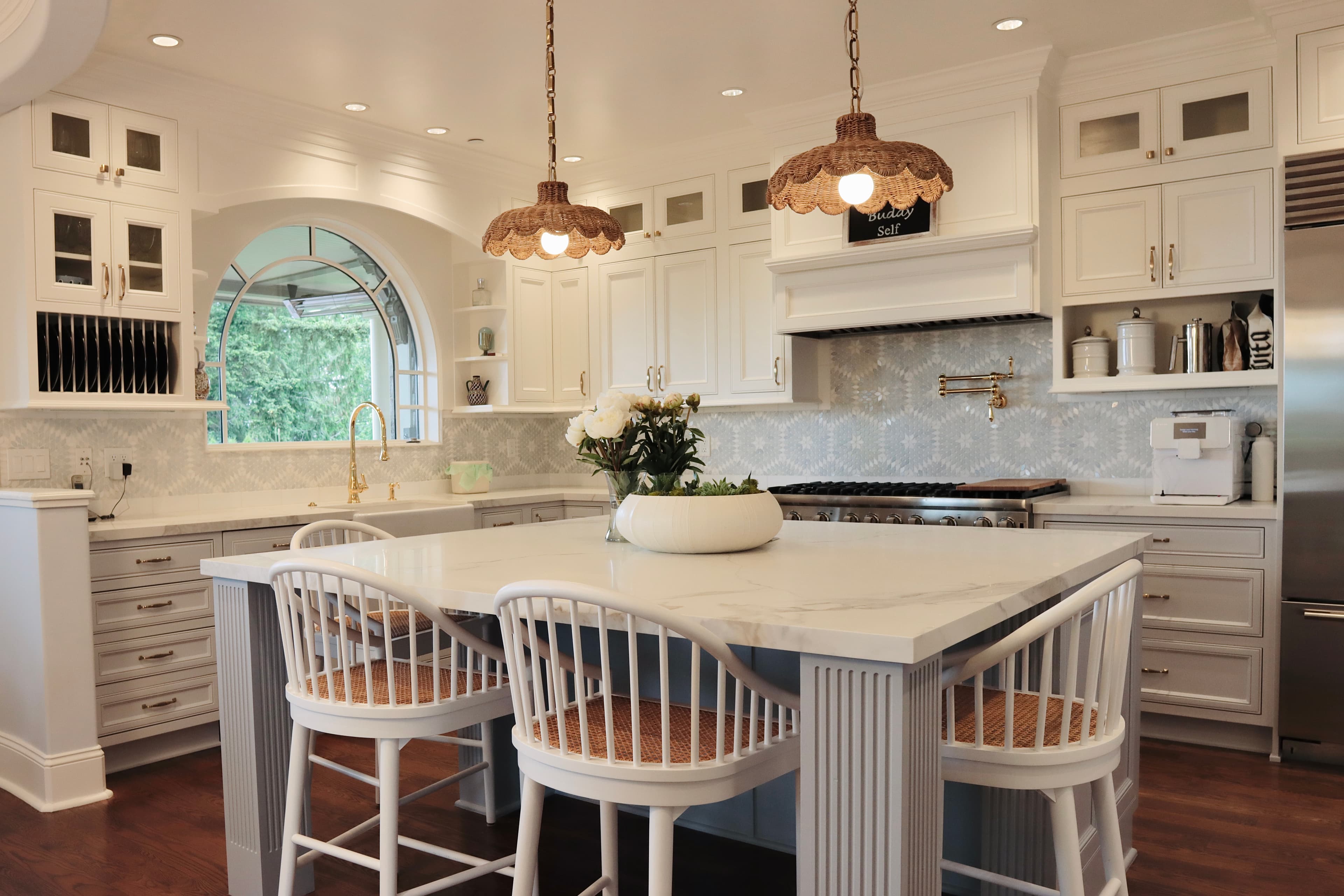 Kitchen view showing island and cabinetry