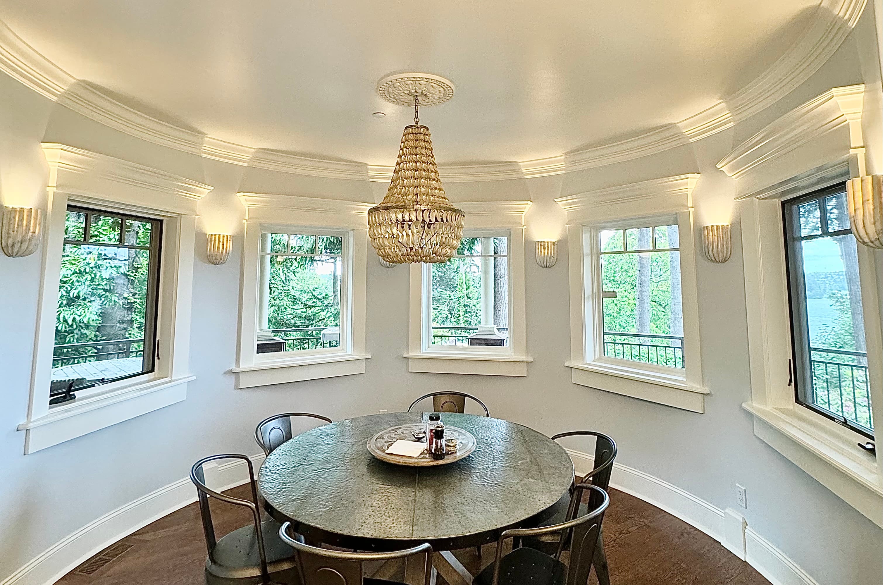 Elegant round dining room with chandelier