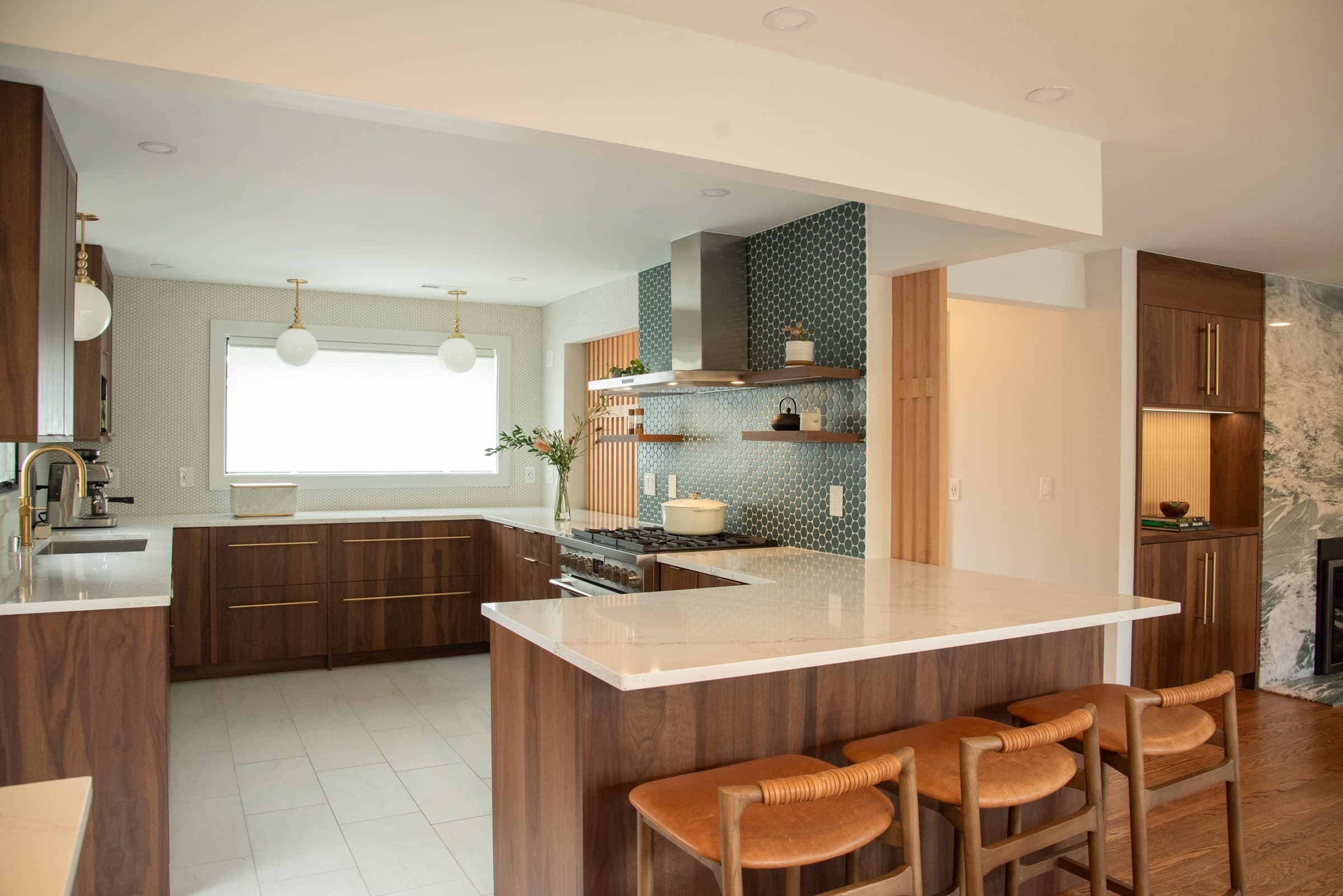 Open plan view from dining through kitchen to foyer